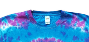 Tie dye Halloween shirt with colours of pink and purple. Closeup crewneck collar