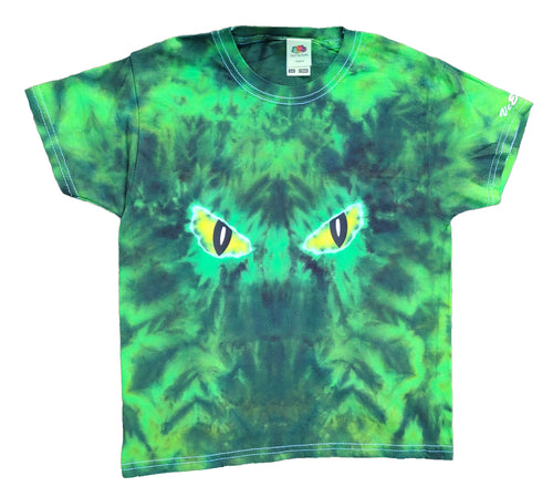 Halloween evil eyes design tie dye shirt. The eyes are yellow with black slits and centred in the middle of the shirt. The overall colour of the shirt is green and black. Front view of the shirt. 