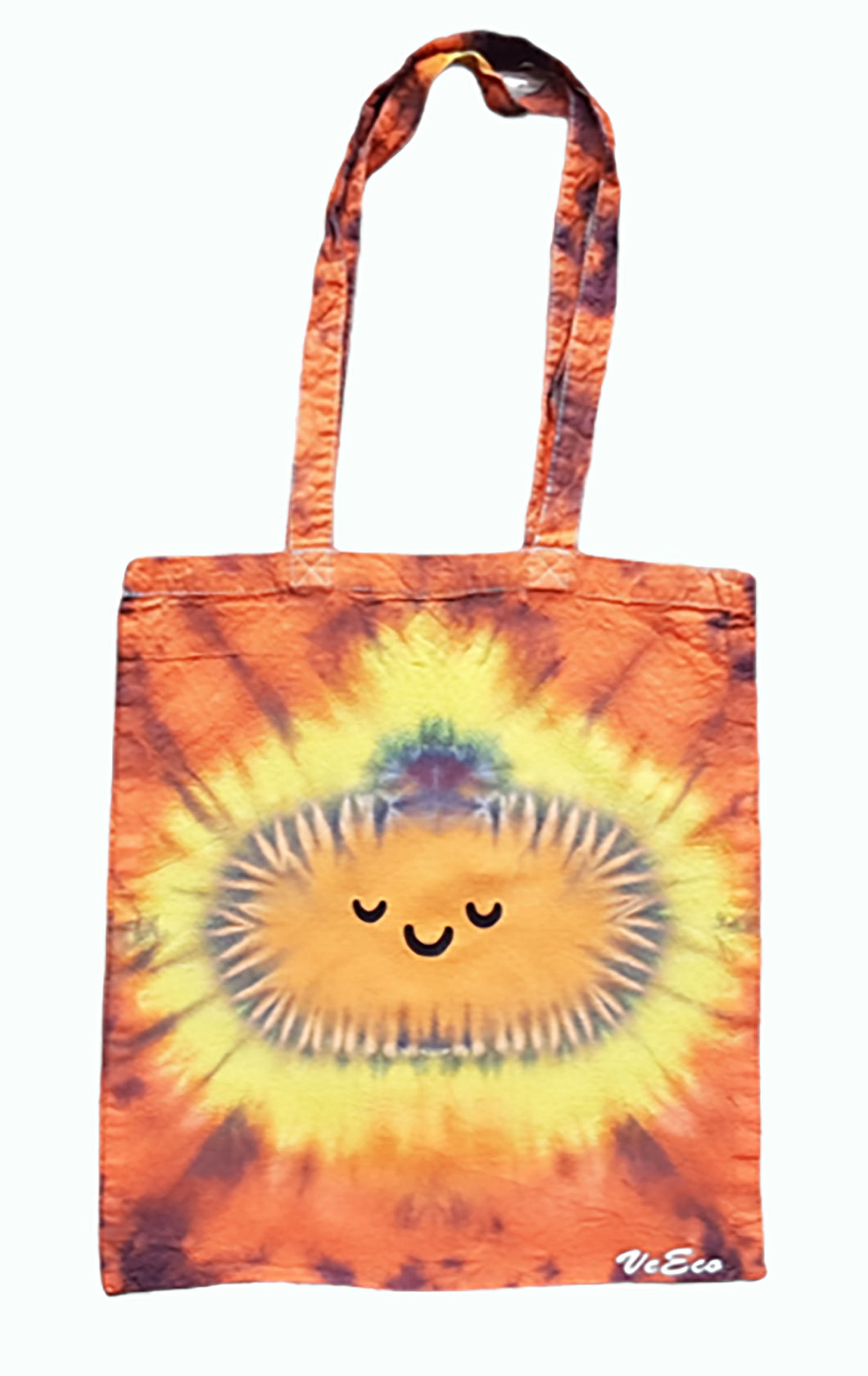 Various Halloween designs tie dye tote bag. Top row includes the designs Evil Eyes, Cute Pumpkin and Skull Face. The bottom row includes Trick or Treat text, Ghost, Cow being abducted by a UFO and a Smiling Pumpkin