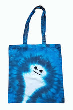 Load image into Gallery viewer, Halloween Ghost design tie dye tote bag. Overall colour of the bag is Blue with a white Ghost with black mouth and eyes