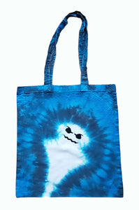 Halloween Ghost design tie dye tote bag. Overall colour of the bag is Blue with a white Ghost with black mouth and eyes