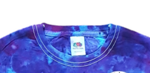 Ice tie dye galaxy shirt. Closeup of the crewneck collar with double stitch hem
