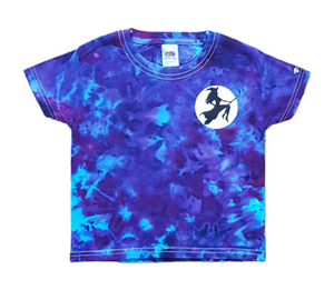 Ice tie dye galaxy shirt with blue and purple colour scheme with a black Witch on a broom flying across a glow in the dark moon. Front view