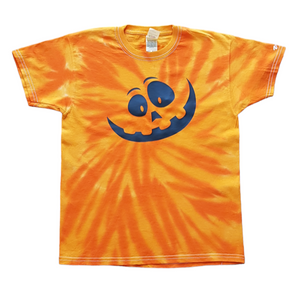 Halloween tie dye pumpkin face shirt. The front view of the shirt is various shades of orange in a swirl pattern and a black pumpkin face