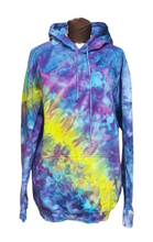 Load image into Gallery viewer, Ice tie dyed Northern Lights inspired hoodie. Overall blue and purple colour scheme with a lime green band diagonal from bottom left to right shoulder. Front view of the hoodie