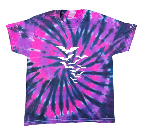 Halloween Flying Vampire Bats design tie dye shirt with purple & pink swirl pattern background. Front view of shirt